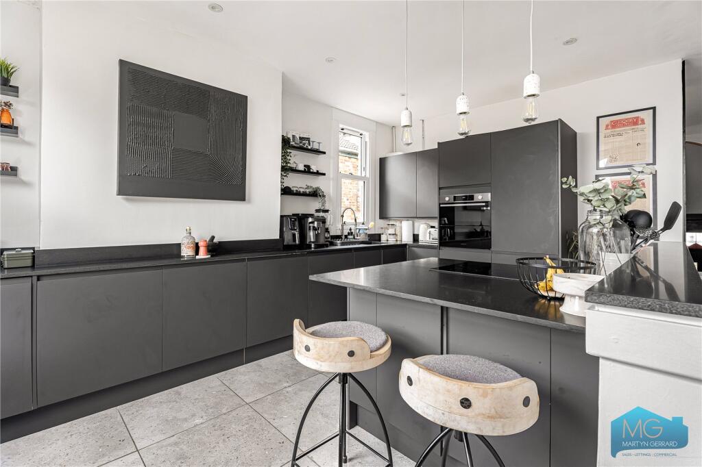 East Finchley renovation — completed kitchen and breakfast bar